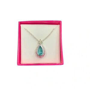 Avon pear shaped necklace with rhinestone accents blue topaz colored pendant NIB